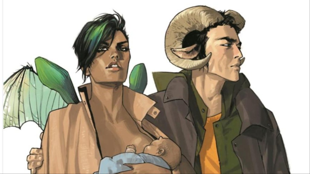Alana breatsfeeding her daughter Hazel, while her husband Marko stands next to her